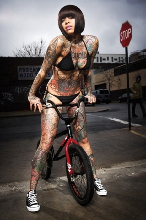 girl_on_bike_with_tattoos.jpg