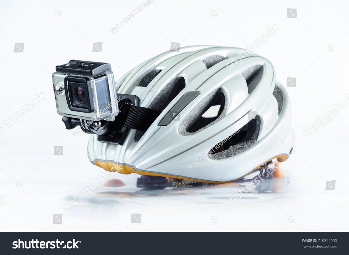 stock-photo-bicycle-helmet-with-front-action-camera-isolated-on-background-710842900.jpg