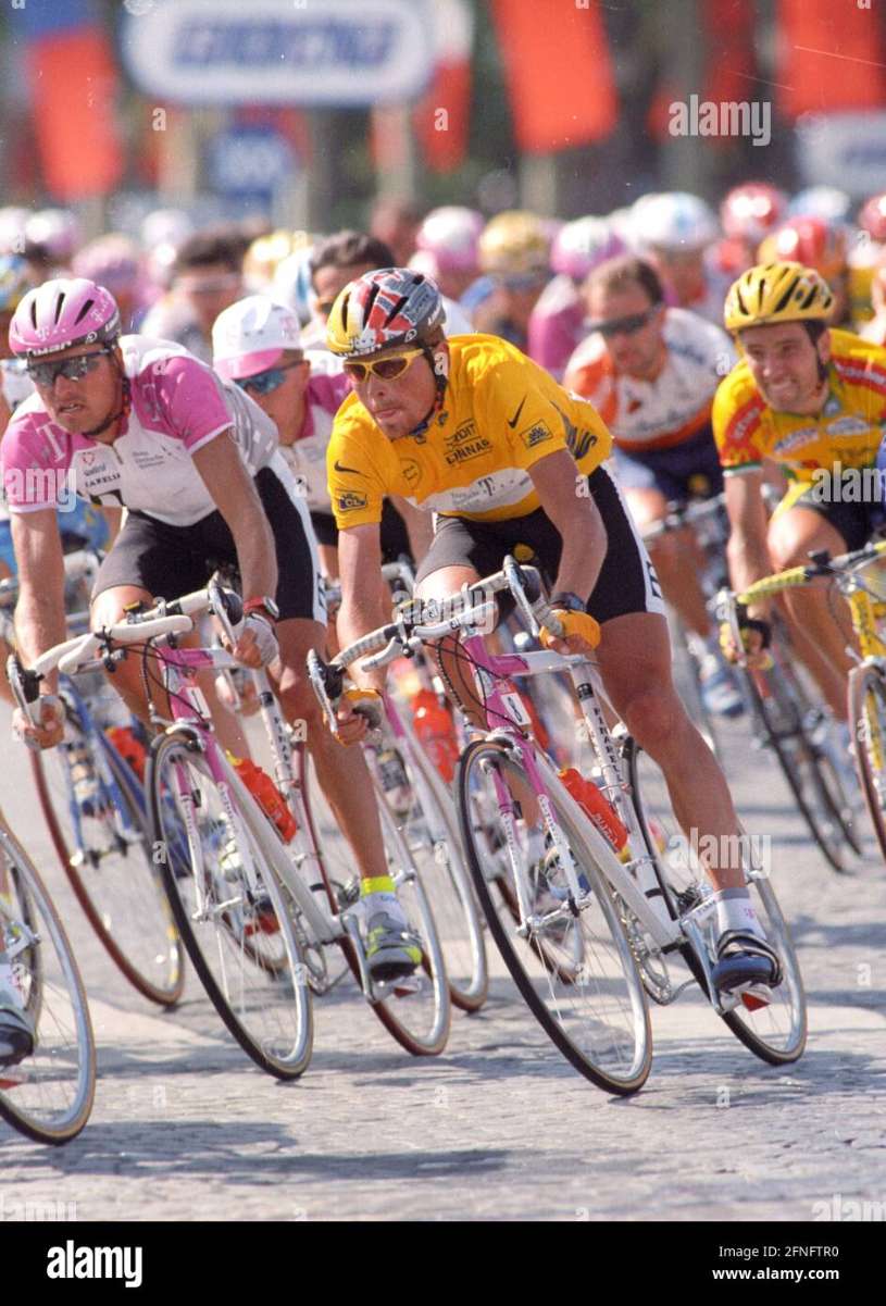 tour-de-france-1997-overall-winner-jan-ullrich-middle-in-action-in-the-yellow-jersey-in-paris-on-27071997-automated-translation-2FNFTR0.jpg